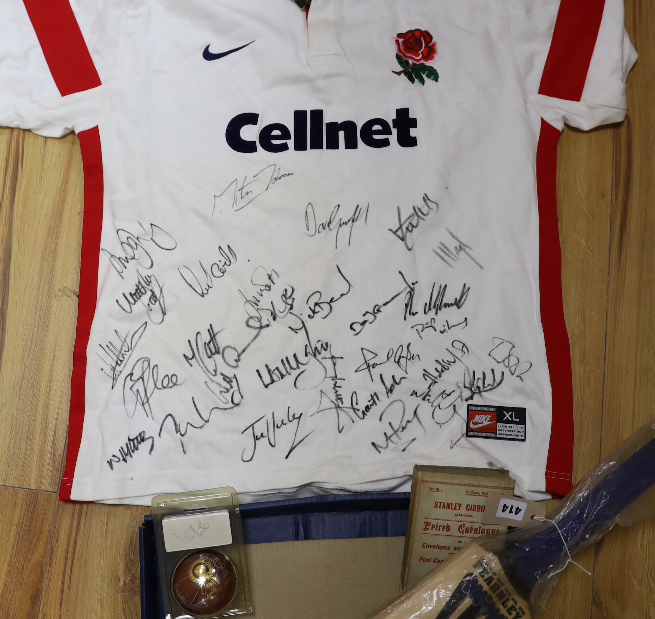 An autographed England rugby shirt, a similar England -v- South Africa 1998 Test Series cricket bat and a cricket ball